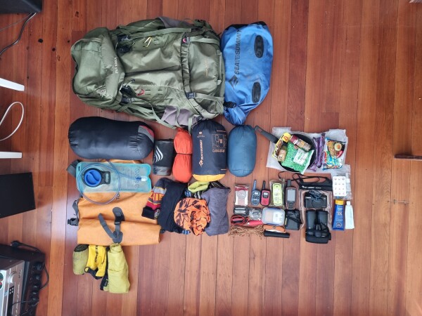 Essential gear laid out and checked then packed into drybags.