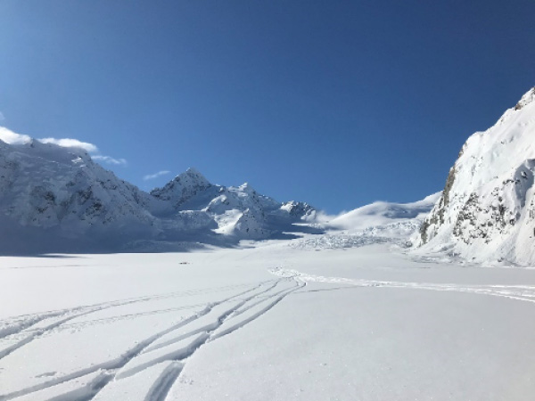 The mighty Tasman Glacier in Aoraki/Mt Cook National Park. Fresh ski tracks following a late August snow top-up.