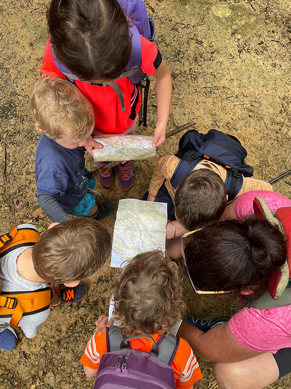 Kids using maps Orongorongo