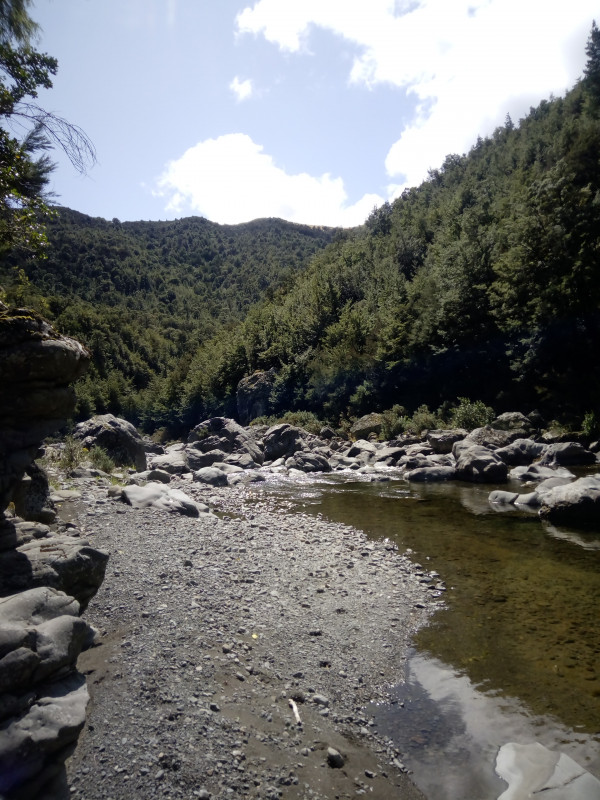 The Okuku River in a similar state to when the family began their walk