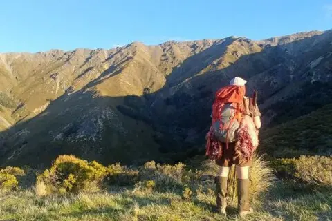 Thumbnail of Hunter with pack for multiday hunt | Nigel Wilson