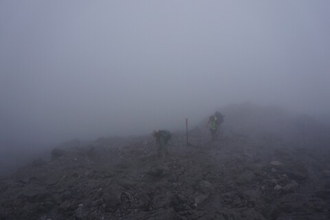 Thumbnail of Trampers in poor visibility Taranaki Maunga